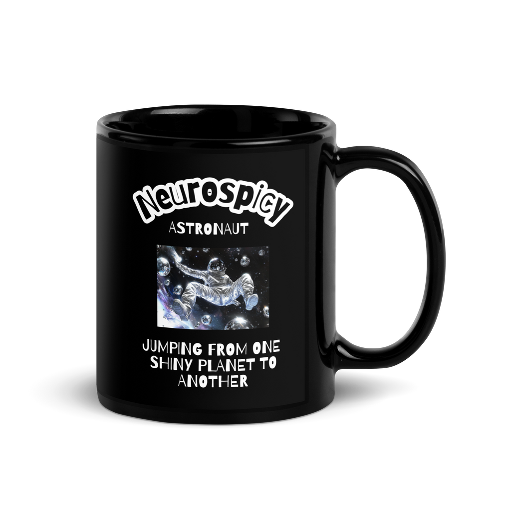 Neurospicy Astronaut Jumping From One Shiny Planet To Another | Black Glossy Mug | The Neurospicy Store